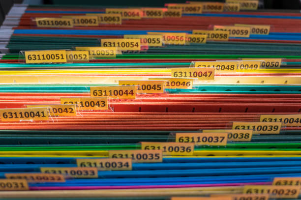 istock Colorful folders are arranged in a file cabinet. 1278789100