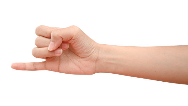 Hand showing little finger sign isolated on white background. Closeup of hand showing little finger sign isolated on white background with clipping path. pinky finger stock pictures, royalty-free photos & images