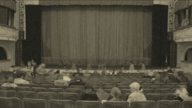 Theatre is filled with spectators (timelapse)