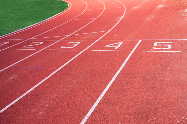 istock Athletic running track in a stadium with start point positions numbers one two, three, four five. 1278793855