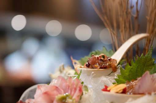 A set of Omakase fish sashimi premium set serve on ice. Japanese food style