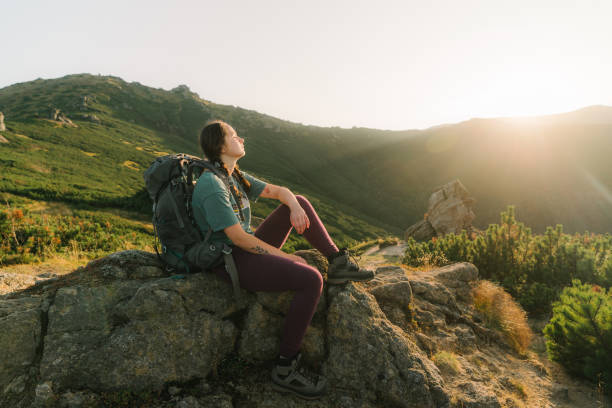 istock Woman hiking in mountains 1278794048