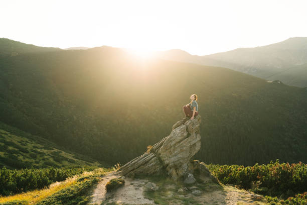 istock Woman hiking in mountains 1278795244