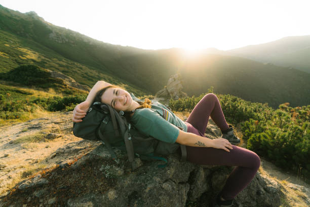 istock Woman hiking in mountains 1278795254