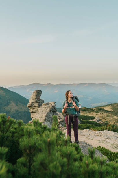 istock Woman hiking in mountains 1278795720