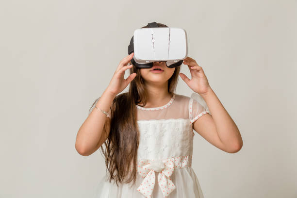 istock Young girl in VR goggles 1278798735