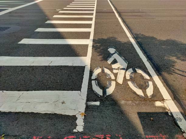 istock Zebra crossing and bicycle signs on the road. 1278800246