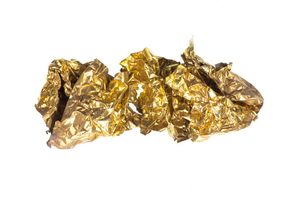 istock crumpled gold foil isolated on white background 1278800528