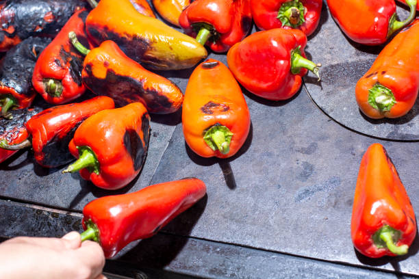 istock Red peppers roasting on a wood-fired stove 1278801789