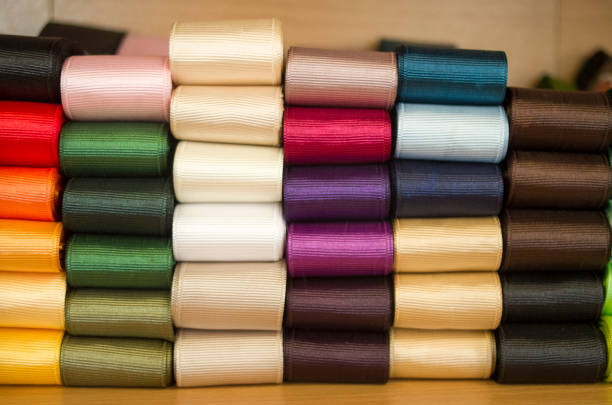 Many new color shiny arranged fabric ribbons closeup