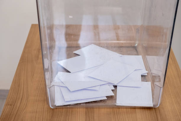 transparent ballot box with ballot box stock photo