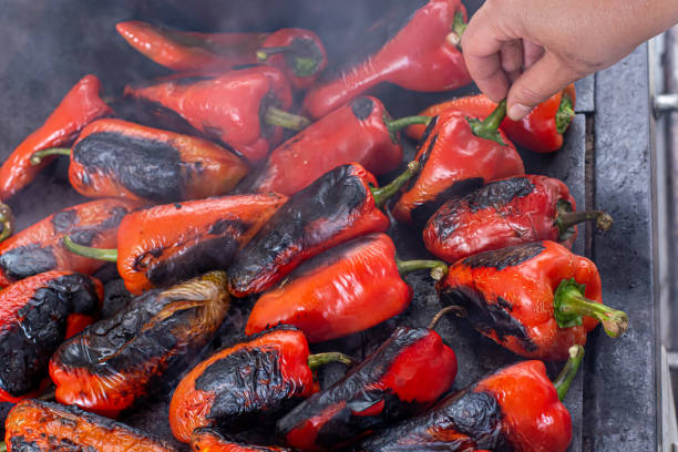 istock Red peppers roasting on a wood-fired stove 1278803734
