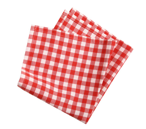 istock Red picnic checkered folded towel isolated on white.Food decoration element. 1278803748