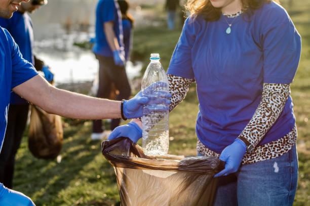 istock Volunteers collecting garbage 1278803752