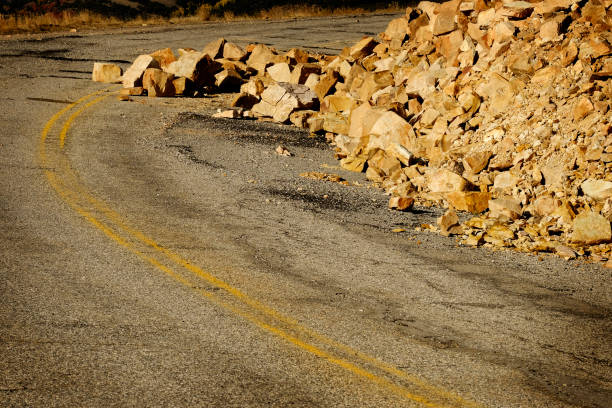 istock Rock avalanche on road roadway drive 1278804012