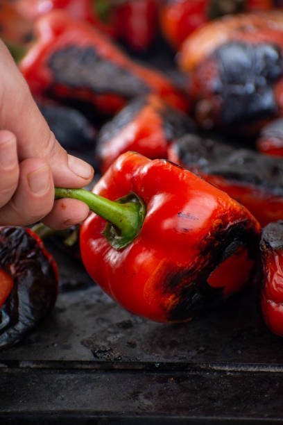 istock Red peppers roasting on a wood-fired stove 1278805043