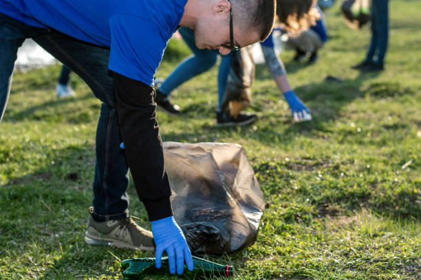 istock Volunteers collecting garbage 1278806642