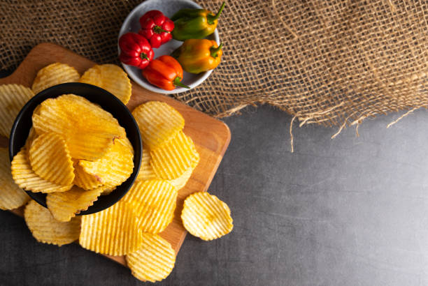 istock Homemade chips with hot peppers . 1278806951