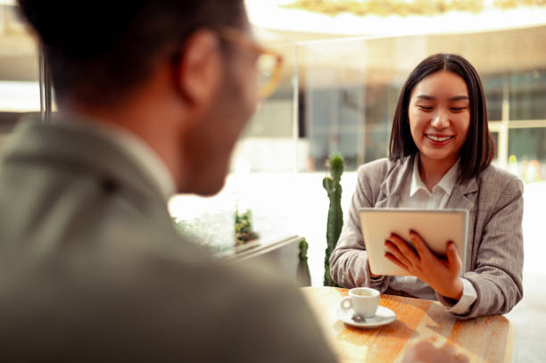 istock Two business people having meeting. 1278808144