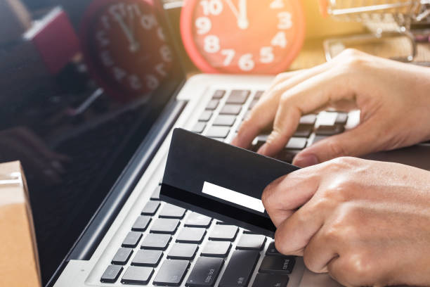 istock A woman is using a computer to shop online 1278812751