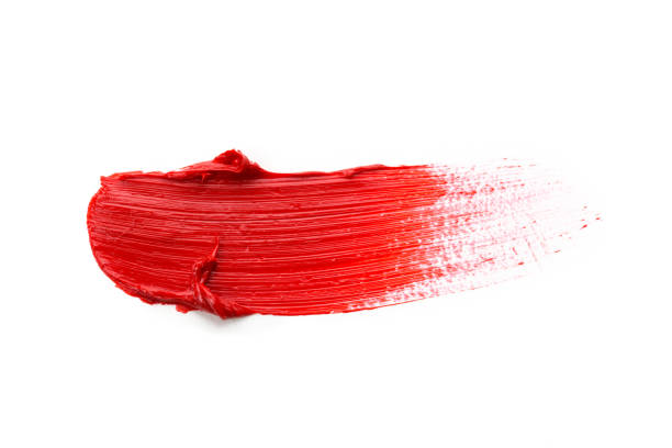 istock Lipstick smear smudge swatch isolated on white background. Cream makeup texture. Bright red color cosmetic product brush stroke swipe sample 1278812937