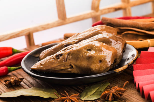 istock Delicious spiced duck head on a plate 1278814130