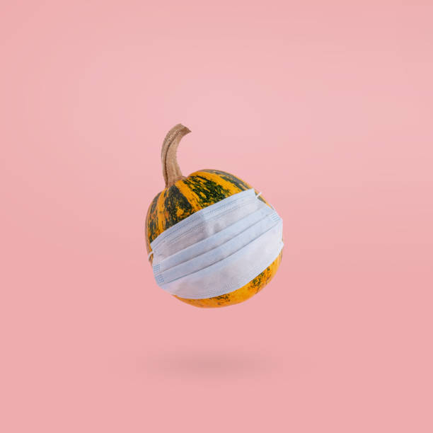 istock Yellow pumpkin with green stripes. 1278815520