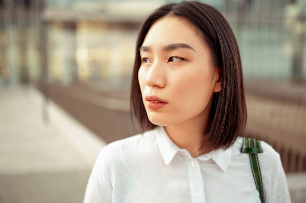 istock Beautiful Asian woman looking away 1278819135