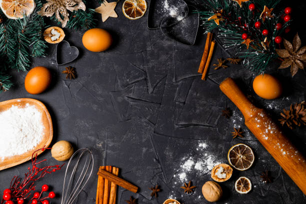 istock Ingredients for baking new year cookies on a black background, top view, copy space 1278819744