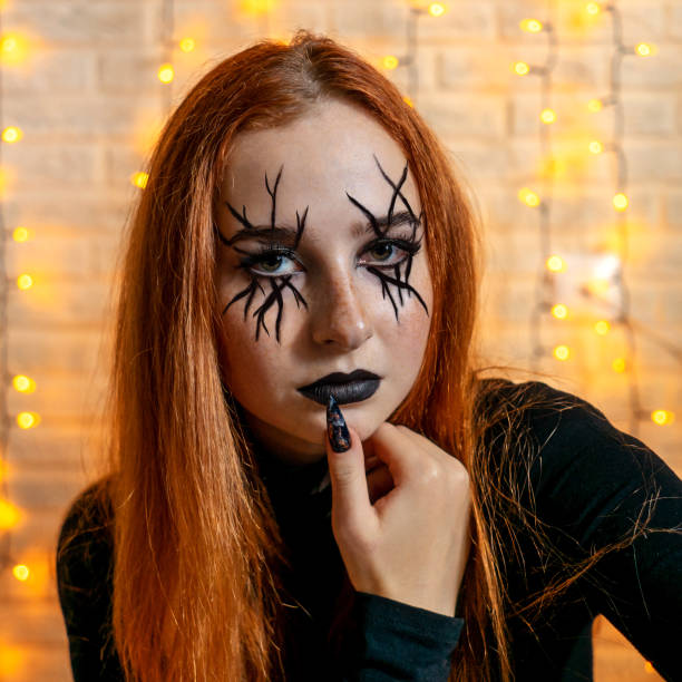 istock Halloween Witch, garland on background. 1278822728