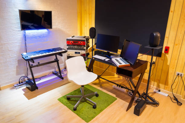 istock home recording studio showing professional audio equipment in small modern working space, wooden wall and floor 1278824635