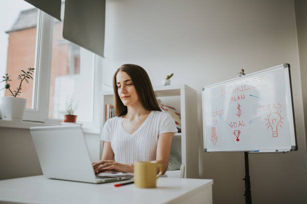 istock Young freelancer is working on lap top from home 1278826179