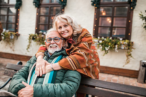 Portrait of happy senior couple enjoying outdoors