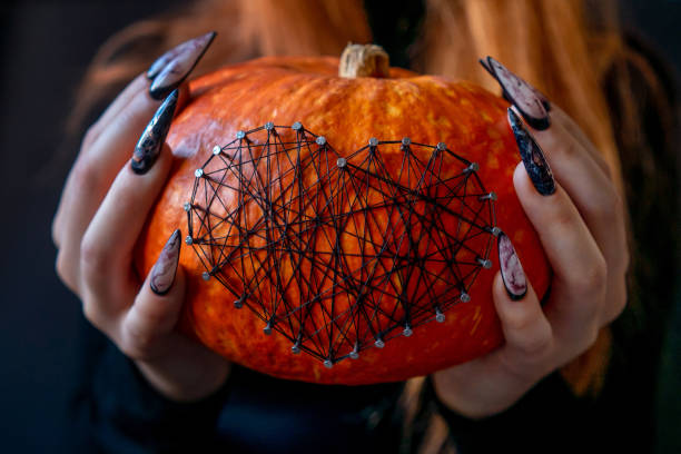 Halloween Nail Art Design, hands and decorations.