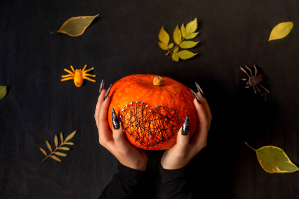 istock Halloween Nail Art Design, hands and decorations. 1278826711