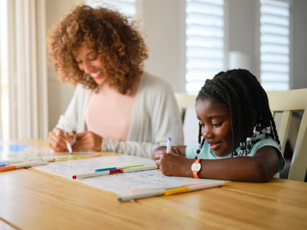 istock Mother and Daughter Remembering a Vacation 1278829400