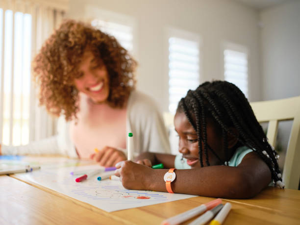istock Mother and Daughter Remembering a Vacation 1278829567