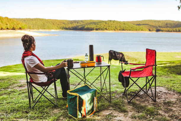 istock Woman resting by the lake 1278831094