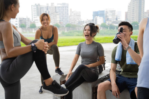 istock A group of friends are talking and stretching after training. 1278831810