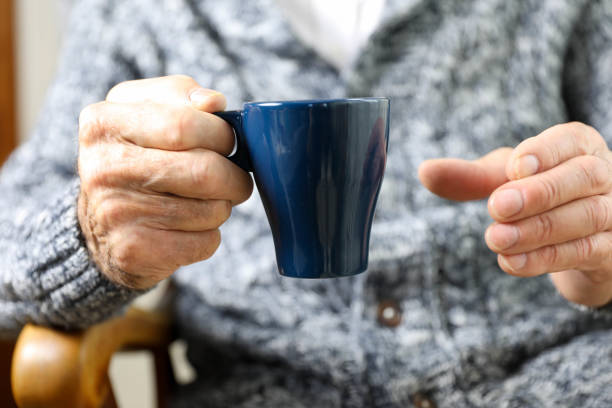 istock An older man with a cup of coffee in his hand 1278833120