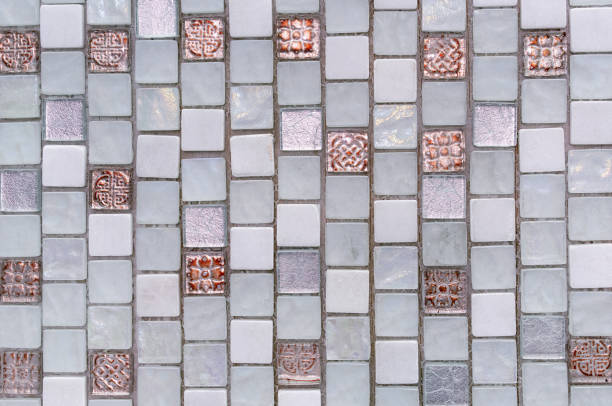 istock Ceramic tile mosaic with blue, gray and brown squares. 1278833538