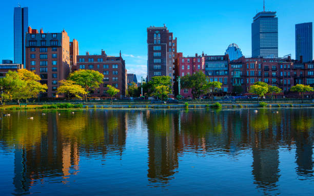 istock Boston downtown skyline and reflections on the water, twilight view from the Red Sox Fields. 1278835085
