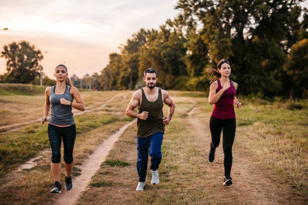 istock Friends jogging together 1278837593