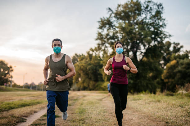 istock Couple jogging together 1278838371