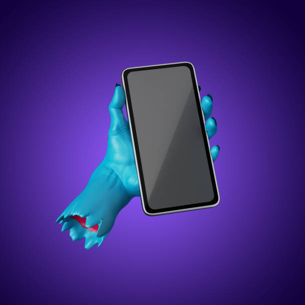istock 3d render, blue zombie hand holds smart phone mobile device, blank screen mockup. Halloween clip art isolated on violet background 1278842517