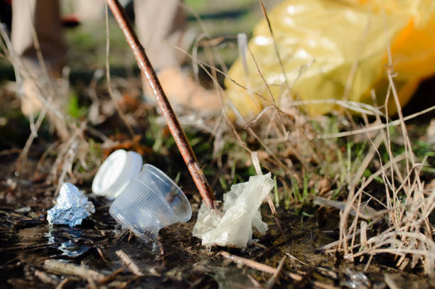 istock Rubbish collecting outdoors in nature, plogging concept. 1278845736