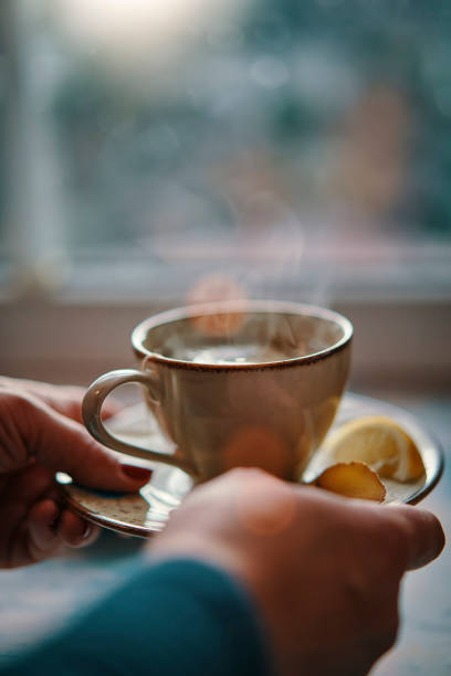istock Cup of Herbal Tea Served with Biscuits 1278845968
