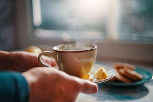 istock Cup of Herbal Tea Served with Biscuits 1278846015