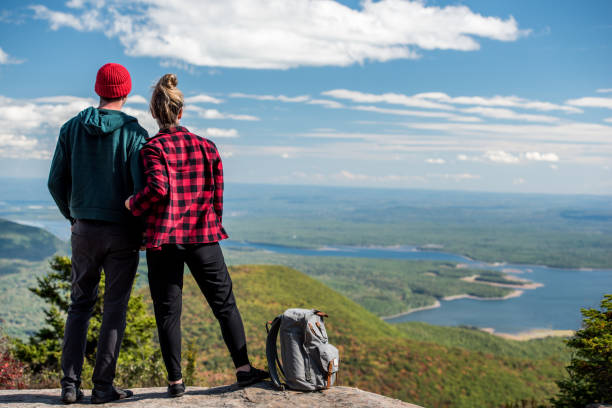istock Young couple at the top of a beutiful mountain. 1278847768