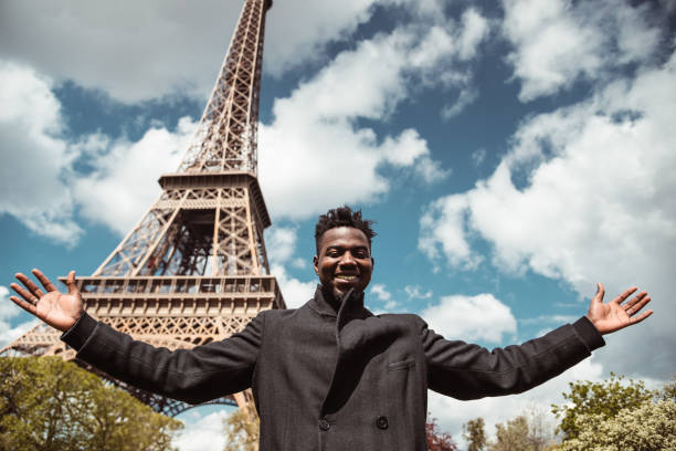 istock afro american tourist under the eiffel tower 1278848403